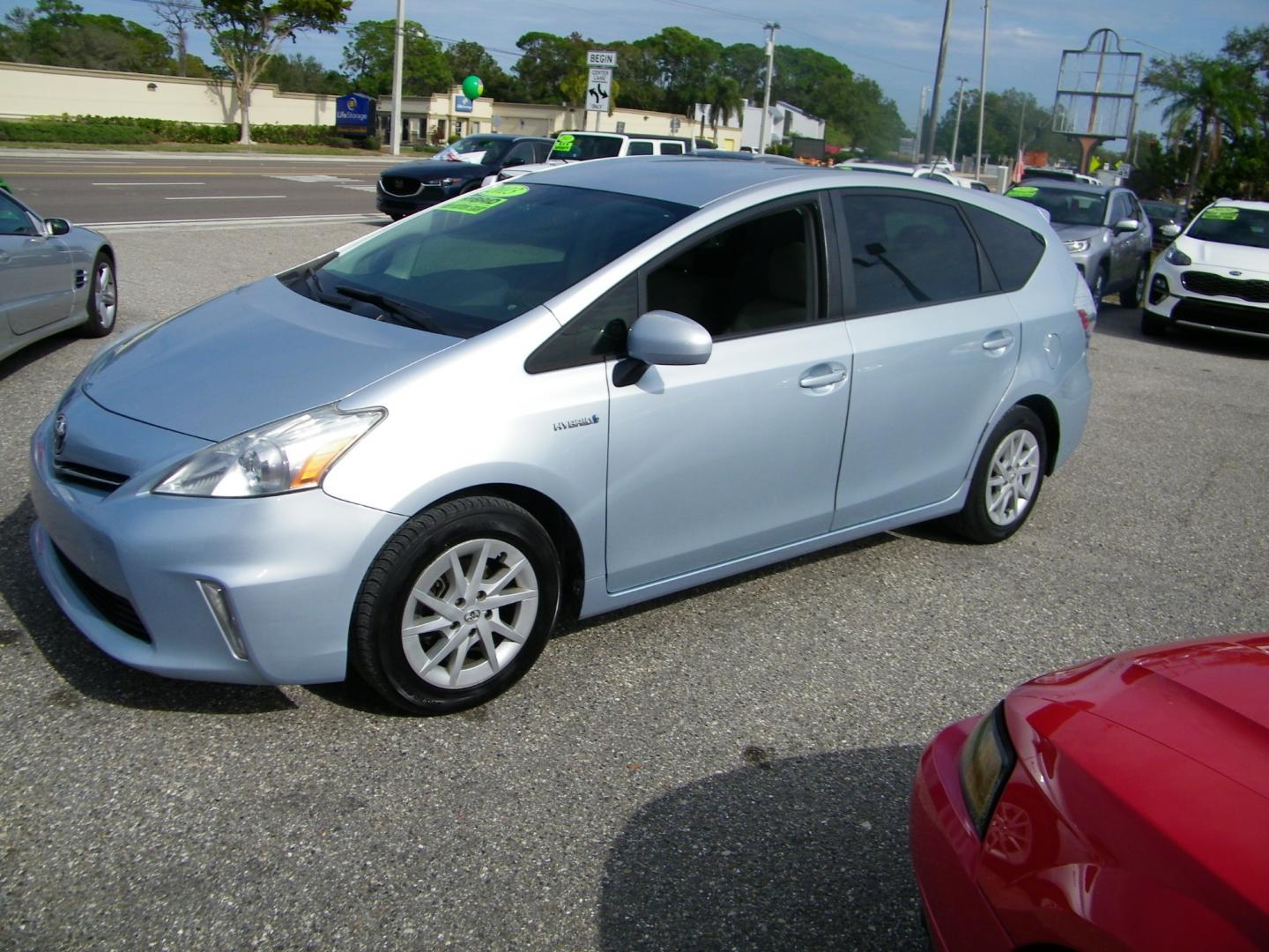 2013 Silver /Beige Toyota Prius V Three (JTDZN3EU5D3) with an 1.8L L4 DOHC 16V HYBRID engine, Continuously Variable Transmission transmission, located at 4000 Bee Ridge Road, Sarasota, FL, 34233, (941) 926-0300, 27.298664, -82.489151 - Photo#0